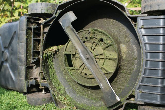 Clean Underneath the Deck of riding lawn mower